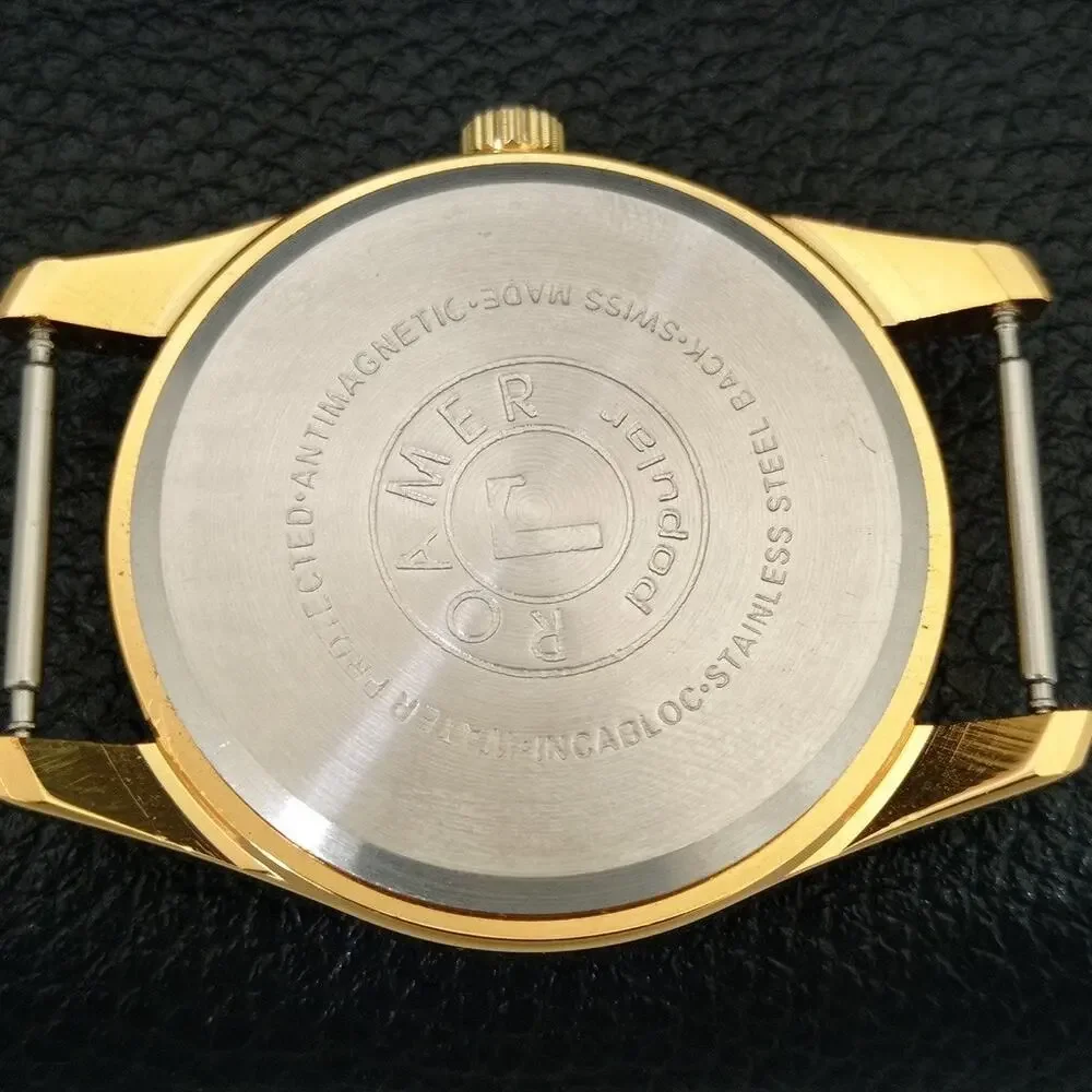 Vintage 1991 Roamer Manual Mens Gold Watch W/Nato Strap & Black accents